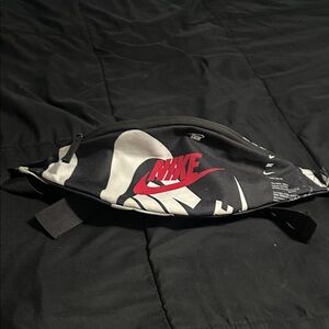 Nike Black and White Waist Bag with Red Logo